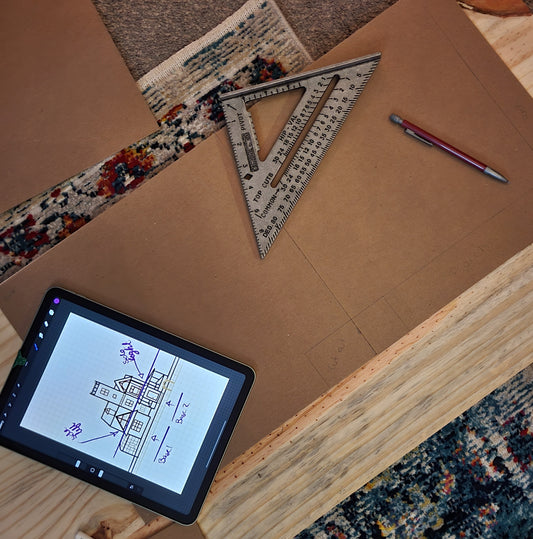My very rough set of "blueprints" and a triangle ruler that I have no idea how to read.